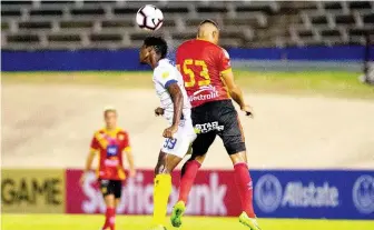  ?? GLADSTONE TAYLOR ?? Waterhouse FC’s Colorado Murray (left) and CS Herediano’s Chrisian Reyes duel for an aerial ball in their Scotiabank Concacaf League game at the National Stadium on Thursday, August 22, 2019.