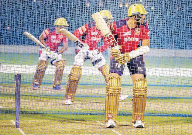  ?? Courtesy: Twitter ?? ↑
Punjab Kings players attend a training session ahead of their IPL match.