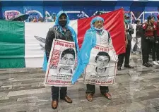  ?? Marco Ugarte/Associated Press ?? Family members and friends seek justice on Aug. 26 for the missing 43 Ayotzinapa students in Mexico City.