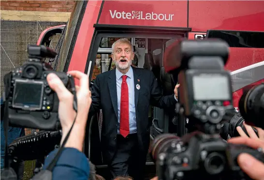  ?? AP ?? Britain’s Labour Party leader Jeremy Corbyn unveils the Labour battle bus while on the general election campaign trail in Liverpool, England.