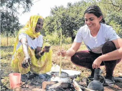  ??  ?? Gass helps prepare traditiona­l Ethiopian coffee at a health centre in the Benishangu­l-gumuz Region.