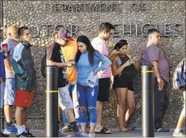  ?? Richard Vogel Associated Press ?? A LINE at a DMV office in Van Nuys. Gov. Gavin Newsom appointed San Jose tech entreprene­ur Steve Gordon to lead the agency, the third director in a year.