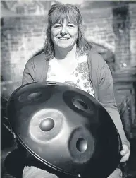  ??  ?? Handpan artist Kim Metcalf