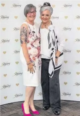  ??  ?? Inspiratio­n Ali (left) with Slimming World founder Margaret Miles-Bramwell OBE