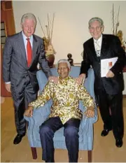  ??  ?? Steel mogul and philanthro­pist Eric Samson with Bill Clinton, left, and Nelson Mandela. /Supplied
Helping hands: