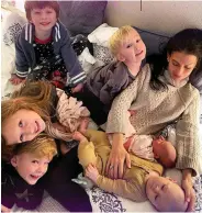  ??  ?? No explanatio­ns required: Hilaria Baldwin with her and Alec’s six children