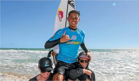  ?? PHOTO: WORLD SURF LEAGUE ?? Kehu Butler is chaired up the beach at Trigg Point in Perth after winning the a leg of the World Surf League Junior Tour.