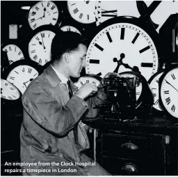  ??  ?? An employee from the Clock Hospital repairs a timepiece in London