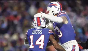  ?? Bryan M. Bennett / Getty Images ?? The Bills’ Gabriel Davis, right, celebrates with Stefon Diggs after scoring a touchdown against the Patriots during the fourth quarter in the AFC wildcard game on Jan. 15.