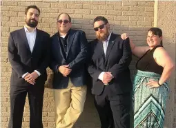  ?? ?? Kansas Publishing Ventures management team poses for a photo before a conference dinner. (l to r) Adam Strunk, Bruce Behymer, Joey Young and Lindsey Young.