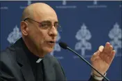  ?? GREGORIO BORGIA — THE ASSOCIATED PRESS ?? The prefect of the Vatican's Dicastery for the Doctrine of the Faith, Cardinal Victor Manuel Fernandez, presents the declaratio­n `Dignitas Infinita' (Infinite Dignity) during a press conference Monday at the Vatican.