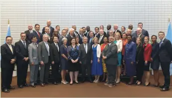  ??  ?? UN Secretary General António Guterres with bank executives from around the world at the United Nations after the launch of the global Principles of Responsibl­e Banking