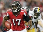  ?? THE ASSOCIATED PRESS FILE PHOTO ?? Atlanta Falcons wide receiver Devin Hester (17) runs against the Pittsburgh Steelers during the 2014 season. Hester is a three-time All-Pro who set an NFL record with 20 career returns for touchdowns.