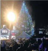  ??  ?? More than 700 messages to loved ones have been hung on the Christmas tree in Market Place