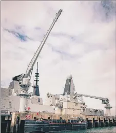  ??  ?? CRITICAL
HMS Diamond alongside the ammunition facility