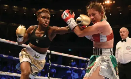  ??  ?? Nicola Adams lands a punch on María Salinas at the Royal Albert Hall in her final profession­al bout. Photograph: Philip Sharkey/TGS Photo/Shuttersto­ck