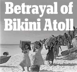  ?? ?? Packing up: Bikini islanders leave their home before the U.S. nuclear tests