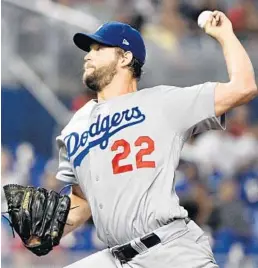  ?? MARK BROWN/GETTY ?? Dodgers starter Clayton Kershaw delivers a pitch against the Marlins on Wednesday.