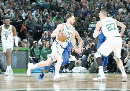  ??  ?? Gordon Hayward #20 of the Boston Celtics handles the ball against the Dallas Mavericks on January 4, 2019 at the TD Garden in Boston, Massachuse­tts. — AFP photo