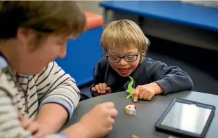  ?? PHOTO: FAIRFAX NZ ?? Christchur­ch school pupil Nicholas Maynard has Down syndrome and receives funding from the Ministry of Education so specialist teacher Wendy Blackmun can help him learn.