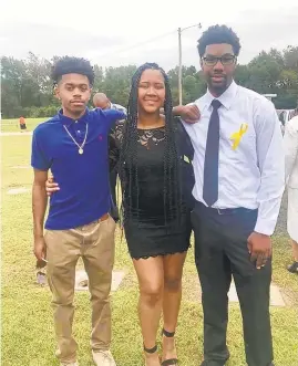  ?? TONYA BURCH/COURTESY PHOTO ?? Tyrique Hudson, right, pictured with brother Shemar Hudson, left, and cousin Shania Cooper, was a software engineer with Northrop Gunman and a North Carolina native.