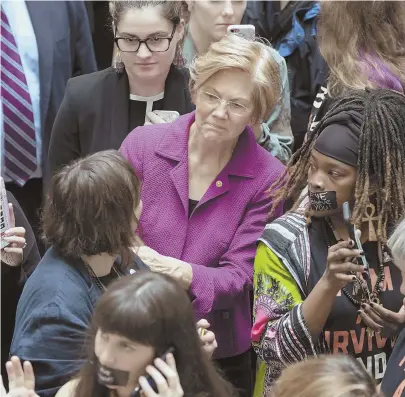  ?? AP PHOTO, ABOVE; STAFF FILE PHOTO BY NICOLAUS CZARNECKI, LEFT ?? AT ODDS: U.S. Sen. Elizabeth Warren (D-Mass.), a vocal critic of Supreme Court nominee Brett Kavanaugh, greets women’s rights activists in the Hart Senate Office Building as the Senate Judiciary Committee met this week. Her opponent, Geoff Diehl, left, speaks at a recent campaign event in Hingham.