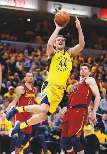  ?? AP ?? Indiana Pacers’ Bojan Bogdanovic (44) shoots against Cleveland Cavaliers’ Kyle Korver during the second half of game three of a first-round NBA play-off series, on Friday in Indianapol­is.
