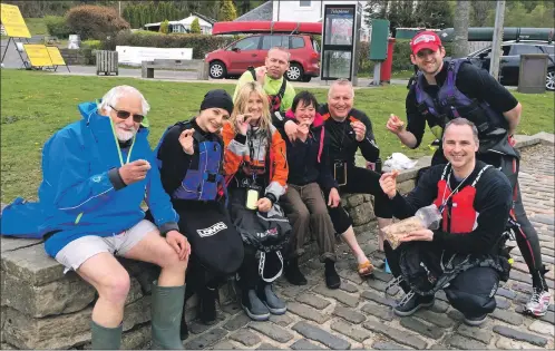  ??  ?? The intrepid team aiming to be the first people to kayak around Loch Ness – and raise mony for a very good cause.