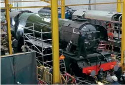  ?? ?? A3 Pacific No. 60103 Flying Scotsman being painted in the National Railway Museum’s workshop on February 17, 2016. ROBIN JONES