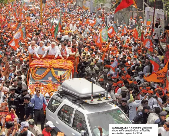  ??  ?? MAHA RALLY A Narendra Modi road show in Varanasi before he filed his nomination papers for 2014