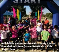  ??  ?? Individual­s gather for the Kern County Cancer Foundation’s Kern Cancer Run/Walk – Kids Jog-a-thon.