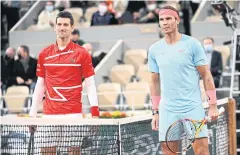  ?? AFP ?? Serbia’s Novak Djokovic, left, and Spain’s Rafael Nadal.