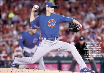  ?? AP ?? Kyle Hendricks, de los Cachorros, volvió a lucir inmenso anoche contra los Nacionales en el primer partido de la Serie Divisional que enfrenta a ambos conjuntos.