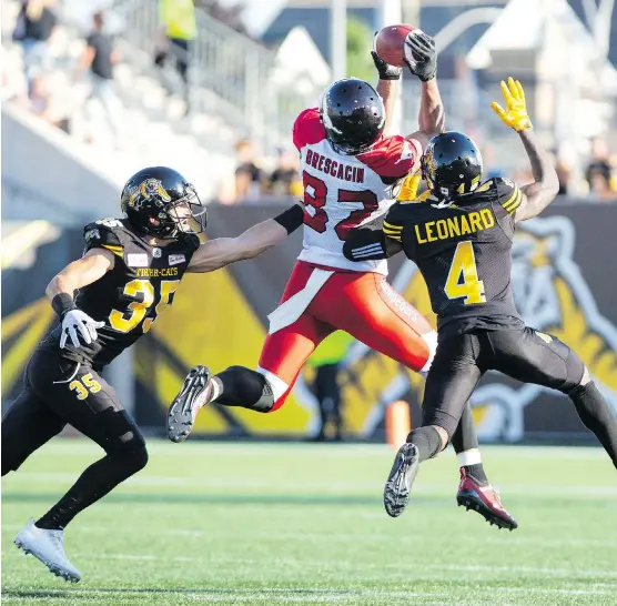  ?? PETER POWER/THE CANADIAN PRESS ?? Stampeders wide receiver Juwan Brescacin was a tower of strength hauling in five passes for 109 yards in Saturday’s 43-28 win at Tim Hortons Field.