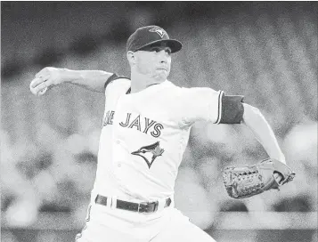  ?? FRED THORNHILL THE CANADIAN PRESS ?? Toronto Blue Jays starting pitcher Aaron Sanchez throws during the first inning of Friday’s American League MLB baseball game against the New York Yankees in Toronto.