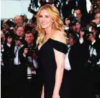  ??  ?? This file photo Actress Julia Roberts poses for photograph­ers upon arrival for the screening of the film Money Monster at the 69th internatio­nal film festival, Cannes, southern France. — AP