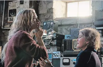  ?? PARAMOUNT PICTURES ?? Emily Blunt and Millicent Simmonds in “A Quiet Place,” in theatres this weekend.