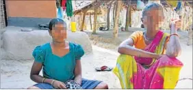  ?? CHITRANGAD­A CHOUDHURY/HT PHOTO ?? The teen survivor with her aunt at their home in Peddagellu­r village.