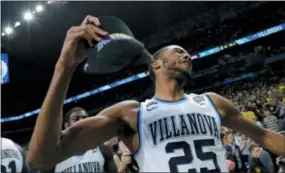  ?? DAVID J. PHILLIP — ASSOCIATED PRESS ?? Villanova’s Mikal Bridges, celebratin­g last week after the Wildcats cut down the nets at the Final Four in San Antonio, declared for the NBA Draft Tuesday.