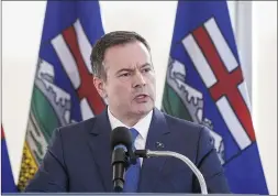  ?? CP FILE PHOTO ?? Premier Jason Kenney speaks during a press conference in Edmonton in this February file photo. The premier says his government has no plans to enforce its way through a second wave.