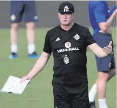  ?? WILLIAM CHERRY/PRESSEYE. ?? Looking to be impressed: Northern Ireland manager Michael O’Neill takes training in Panama