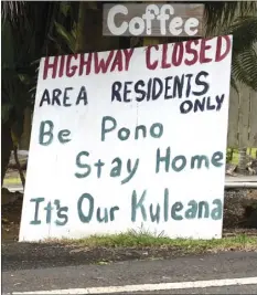  ??  ?? A sign along Hana Highway in Kailua admonishes nonresiden­ts to leave East Maui to its residents.