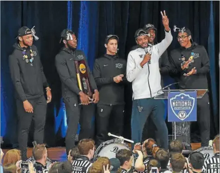  ?? PETE BANNAN — DIGITAL FIRST MEDIA ?? Villanova’s Mikal Bridges speaks to the crowd at the Nevin Fieldhouse after the Wildcats returned to campus Tuesday following their national championsh­ip victory.