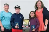  ?? ?? Kason Moffitt and Sophia Dyck-Funk received the Fighting Heart Award at the Swift Current ACT/UCT Stingrays awards night, Oct. 16. It was presented by coaches Jackie Powell (at left) and Joanna Ladouceur.