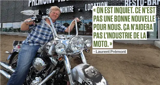  ?? PHOTO D’ARCHIVES ?? Laurent Prémont devant son magasin de Québec avec une moto aux couleurs du défunt chanteur français Johnny Hallyday.