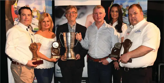  ??  ?? Gavin Kelly and Elaine Ni She receive the Maurice O’Donoghue Memorial Cup from Patrick O’Donoghue with Jeff Aherne, cartell.ie, Mags Milner and Anthony O’Connor, Clerk of the Course, at the cartell.ie Internatio­nal Rally of the Lakes 2017 prize giving...