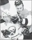  ?? Steven M. Falk, ?? Philadelph­ia Flyers’ Zac Rinaldo checks Buffalo Sabres’ Derek Roy on Thursday night.