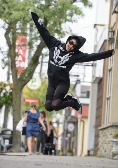  ?? GARY YOKOYAMA, THE HAMILTON SPECTATOR ?? ANYTHING BUT BASIC: Black logo hoodie from Hamilton Hooligan. Teresa’s leggings are from Michi Canada.