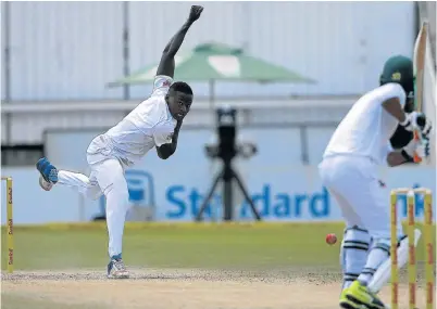  ?? Picture: AFP/MARCO LONGARI ?? IN RAMPANT FORM: Kagiso Rabada delivers a ball to Bangladesh’s Mahmudulla­h to take his 100th test match wicket yesterday. It was the third time Rabada had taken 10 wickets, in only 22 tests