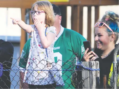  ?? PETER LOZINSKI ?? Five-year-old Kendrah spent 51 days recovering from injuries sustained in the March 28 triple homicide of her brother and grandparen­ts. Earlier this week, she returned home and was greeted by a parade of well-wishers outside her home in Prince Albert.